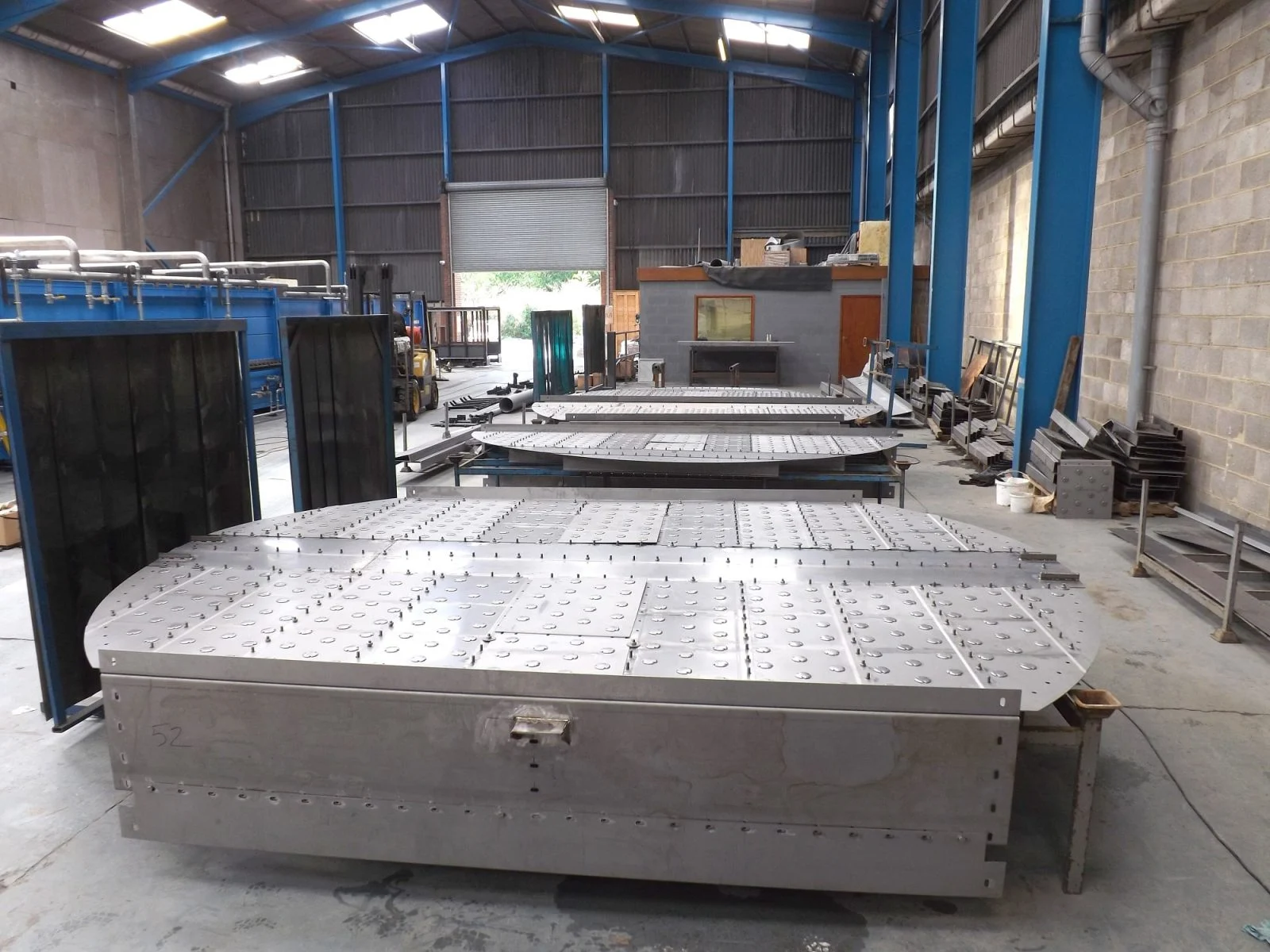 Stainless steel trays in the DTEC workshop
